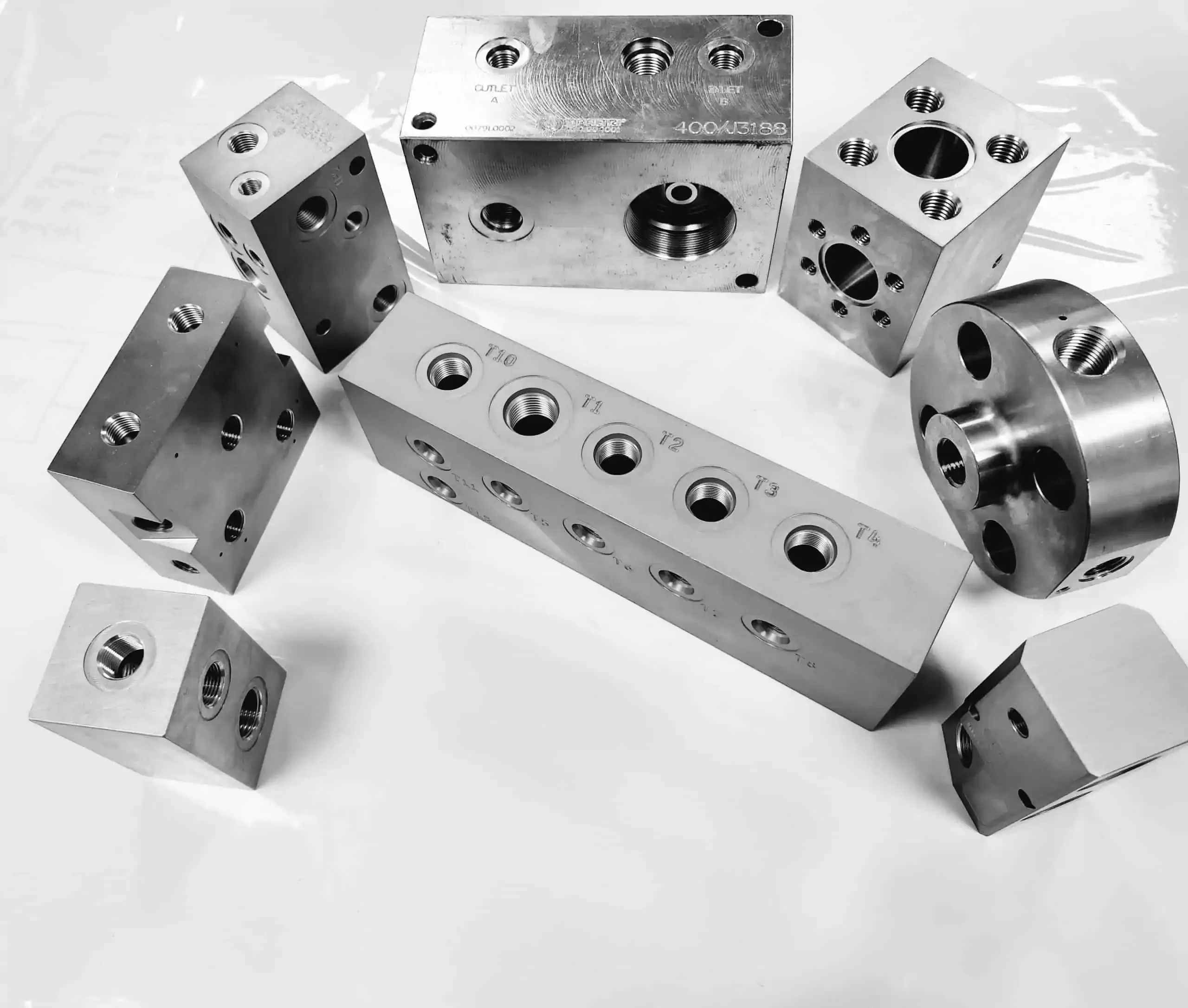 Machined valve and manifold bodies